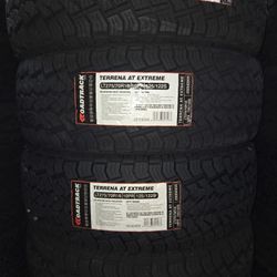 (4) 275/70r18 Roadtrack A/T Tires 275 70 18 Inch AT  10-ply LT E Rated 33