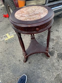 Round Mahogany marvel table