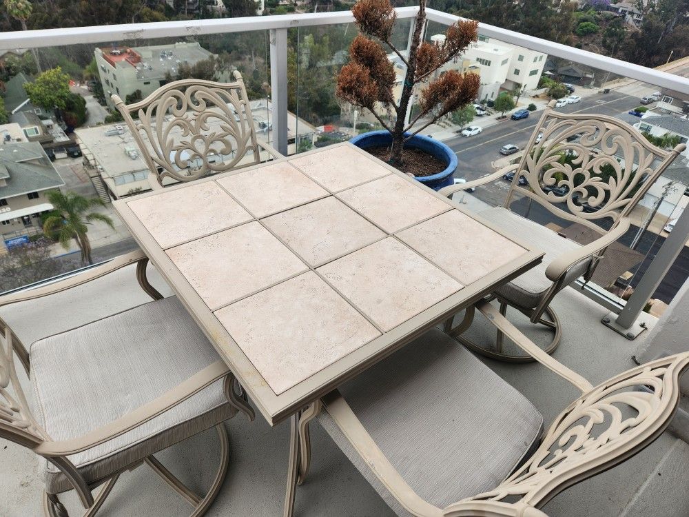 stone backyard patio table and chair set