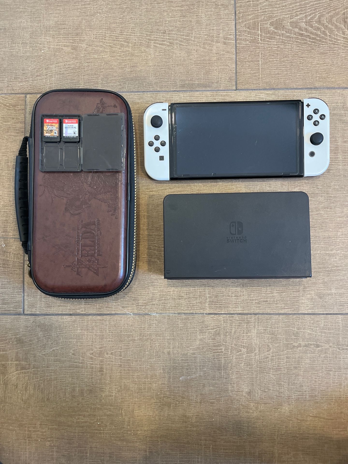 Nintendo Switch Oled Bundle - Includes Super Smash Bro. & Zelda: Breath Of The Wild