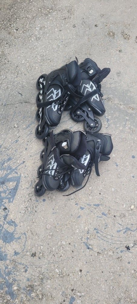 2 Pair Of Adjustable Inline Skates