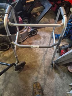 Walker with wheels on front good shape