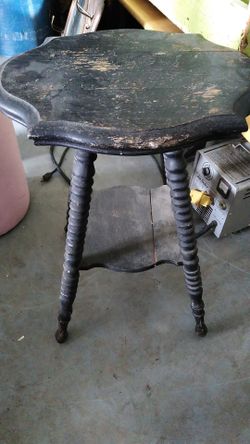 Funky black antique spiral leg table