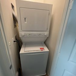 Like New Frigidaire Quick Wash Dry Cycle, Maxfill Stacked Laundry Center with 3.9-cu ft Top load Washer and Electric 5.6-cu ft Dryer