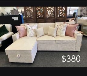 2-pc Sectional sofa with pull-out bed & storage chaise