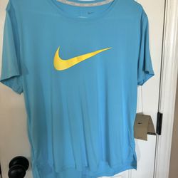 NEW with Tag Ladies size Large Nike Dri-Fit  top.  See More Below!!