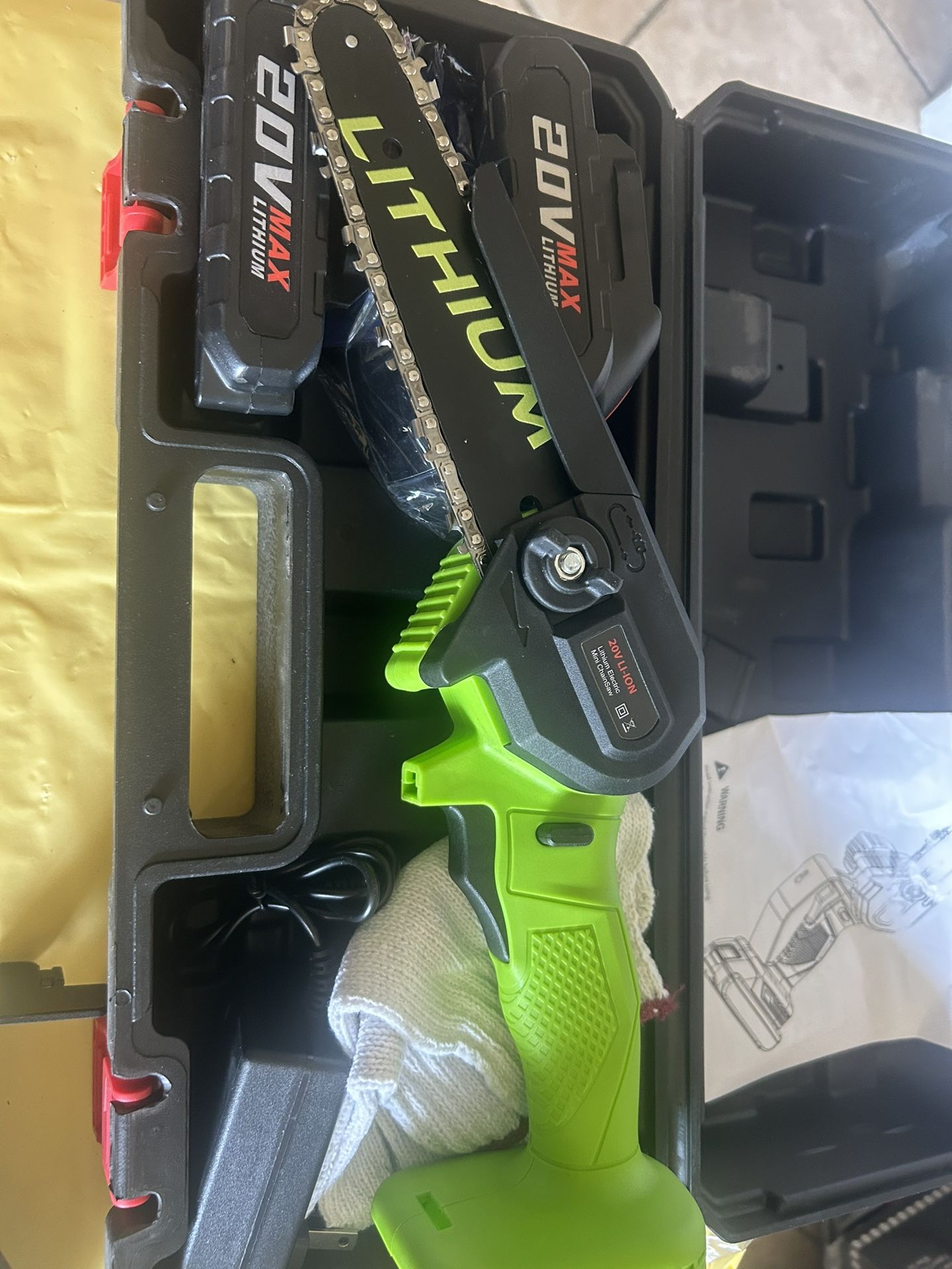 6 Inch lithium chainsaw. It comes with two batteries with the safety gloves and safety goggles.
