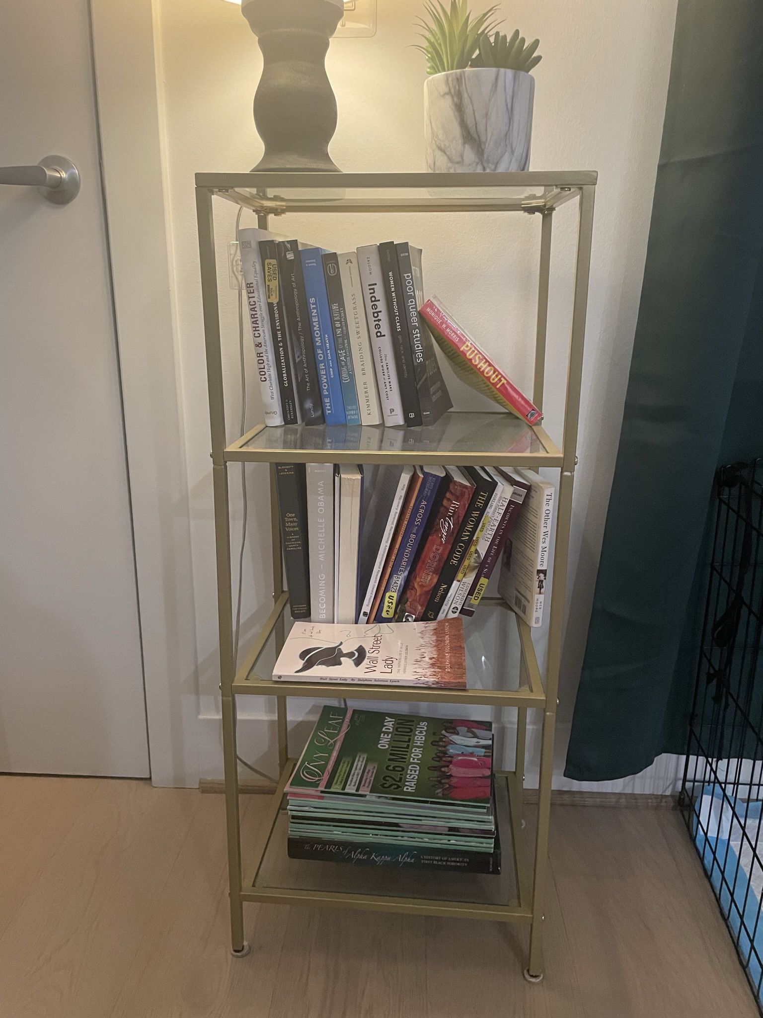 GOLD AND GLASS STAINLESS STEEL BOOKCASE