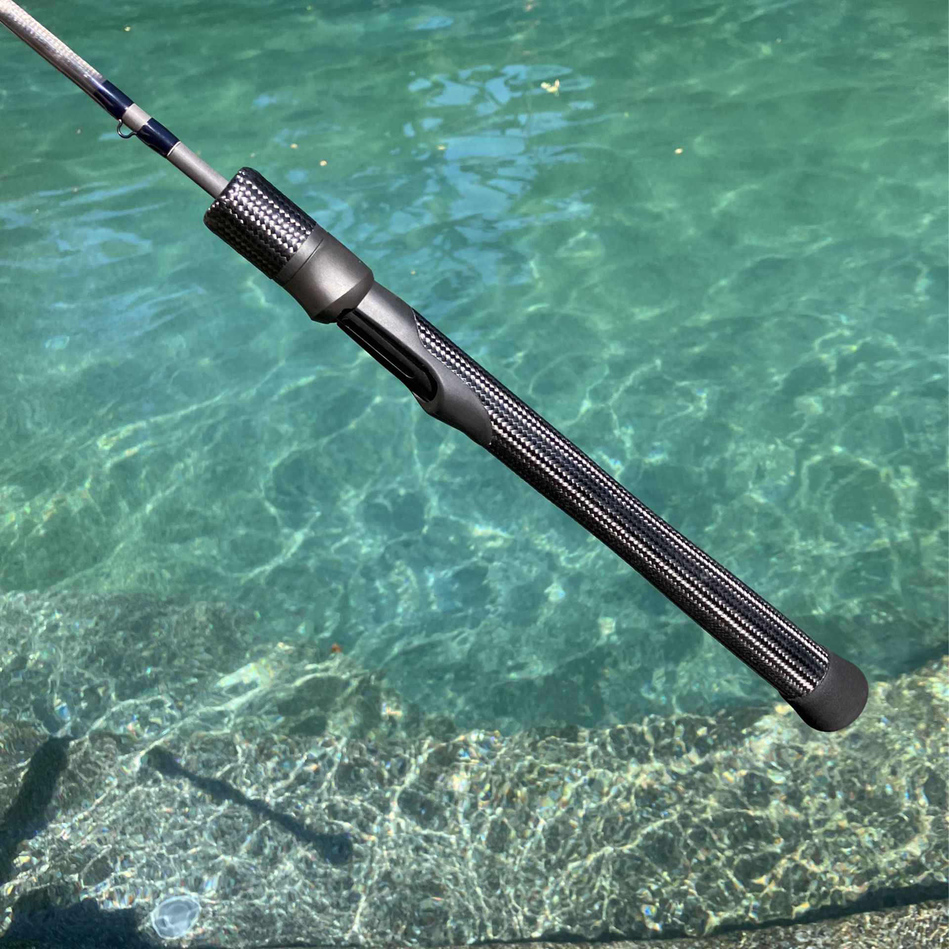 Mezger Custom Rods 6’ light power, moderate-fast action spinning rod.