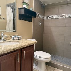 Beautiful bathroom vanity with granite top and faucet