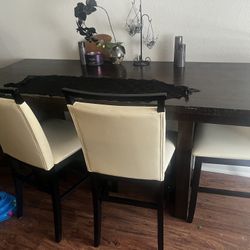 Brown table with chairs