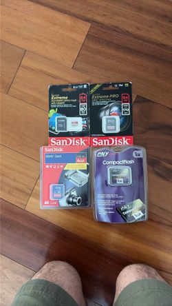 SanDisk Lot 1GB, 4GB, (2)64GB Cards NEW IN PACKS