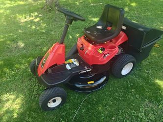 Troy-Bilt 30 inch riding mower with bagger attachment