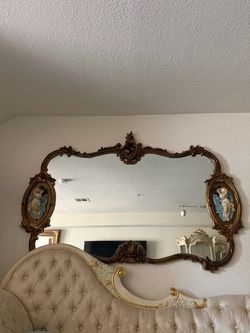 a Vintage French Rococo / Louis XV Style Gold Wall Mantle Mirror with Bisque Figural Lovers Plaques.