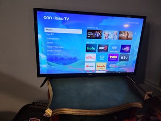 32-inch Roku TV w/ remote. PERFECT CONDITION