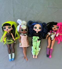 L.O.L  Surprise O.M.G Dolls  4 dolls included, see photos (not perfect). OBO