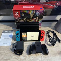 NINTENDO SWITCH LIKE BRAND NEW! It Comes With 1 Case + 1 Game + Dock + Joycons + Controller Holder + Box + Charger + Joycon Protector + Headphones