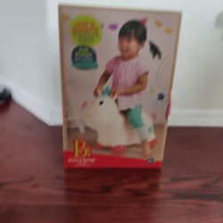  B. toys Bouncy Boing Pixie Unicorn ride-on bouncer featuring a colorful, inflatable unicorn design