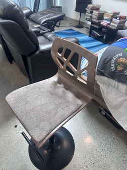 Two swivel bar stool chairs