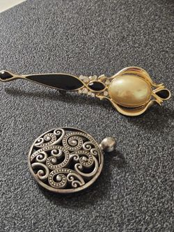 brooch and pendant.