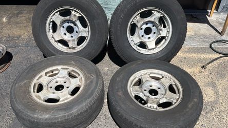Chevrolet or GMC Truck or van 16 Inch aluminum wheels with old tires