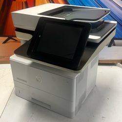 HP M528dn B/W laser multi-function laser printer.