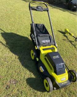 RYOBI battery operated lawnmower ( battery included )