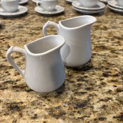 Revol cream pitchers