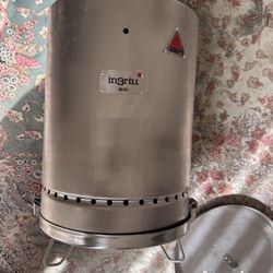 Grill Mini barrel smoker and grill.