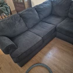 Brown Sectional With Chaise Lounge. Has 1 Little RIP Pic To Show It. Under Loveseat Needs To Be Replaced With Fabric. 