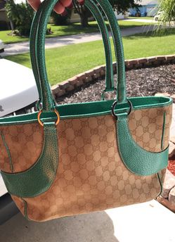 AUTHENTIC Gucci bag .. unique teal details