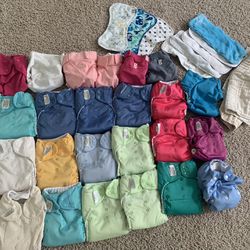Cloth Diapers - 15 BumGenuis, 4 G-diapers, 2 Swim Covers, 10 Extra Inserts. One 40 L Bin With Waterproof liner Bag