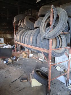 Tire Rack With Lots Of Tires Some Good Somre 