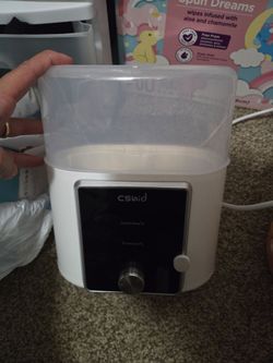 Bottle warmer and sanitizer