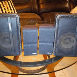 2  Bose Model 101 Speakers And 2 Cube Bose Speakers