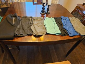 6 pairs of shorts and 1 pair of sweatpants