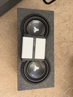 JL amp and subs in sealed box