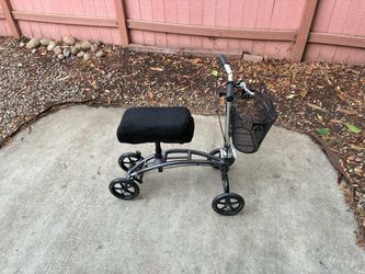 Knee scooter with aftermarket knee pad