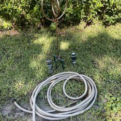 3- Sprinklers And A Garden Hose