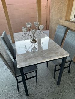 Marble dining table with 4 chairs— new.