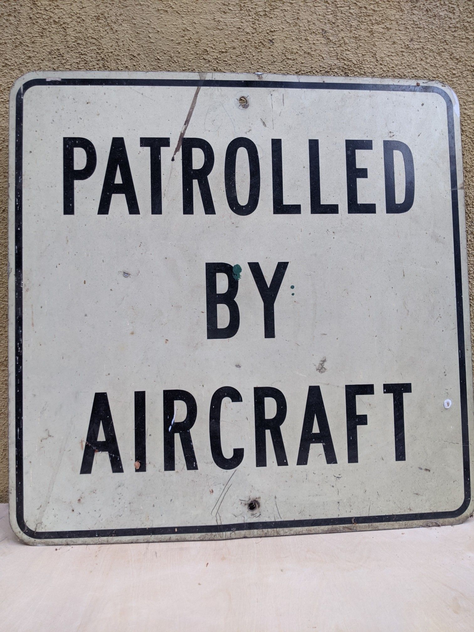 Sign patrolled by aircraft