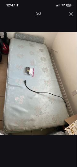 Adjustable twin bed with remote