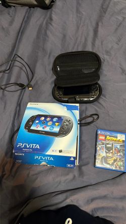 Ps vita bundle - charger lego Batman 2 case and includes box.