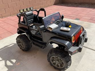 12v Baby Electric  car  with remote and charger ,works perfect  (Pick up only)