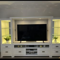65 inch TV. Entertainment center