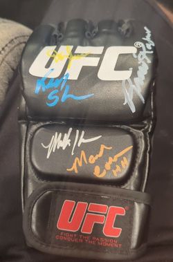 UFC Glove Multi-Autographed MMA Collectible. Ken Shamrock, Mark Kerr, Rico Rodriguez, Mark Coleman, and Dan Severn.