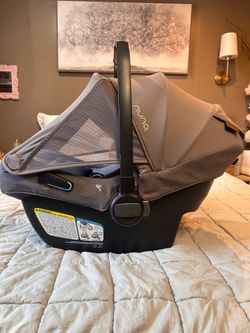 Nuna Pipa Aire RX infant car seat with base