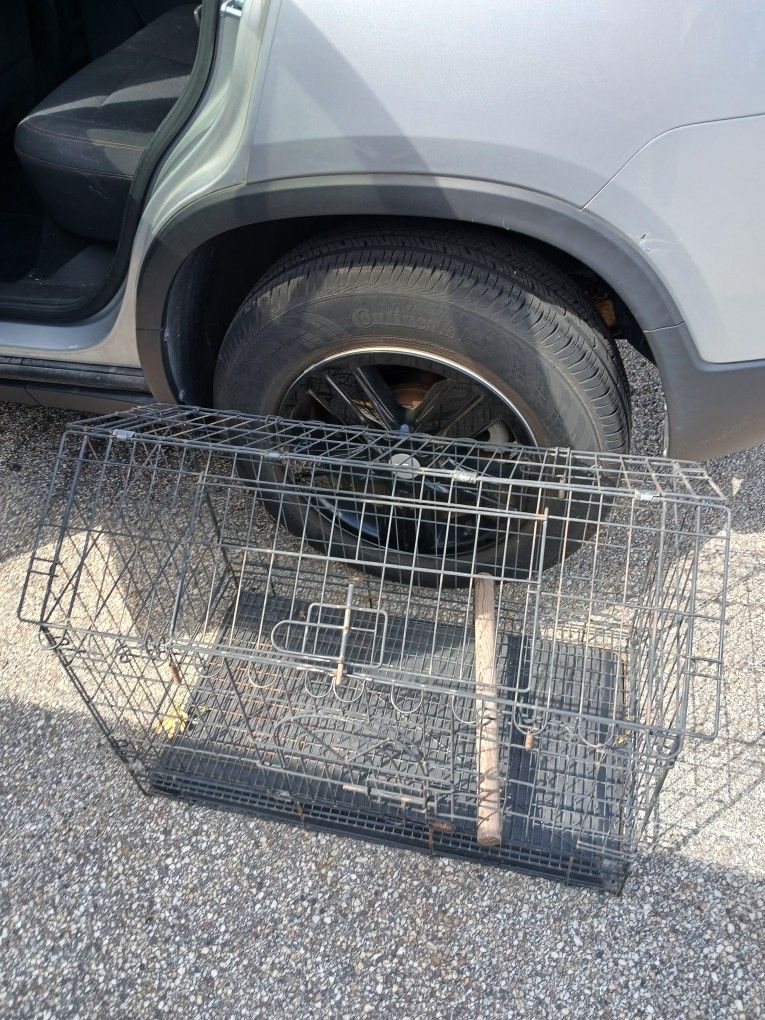 Small Critter Cage. Used for My Rabbit and My Chicken. Cage Is In GREATshape. It Has an Opening On Top And In The Front.