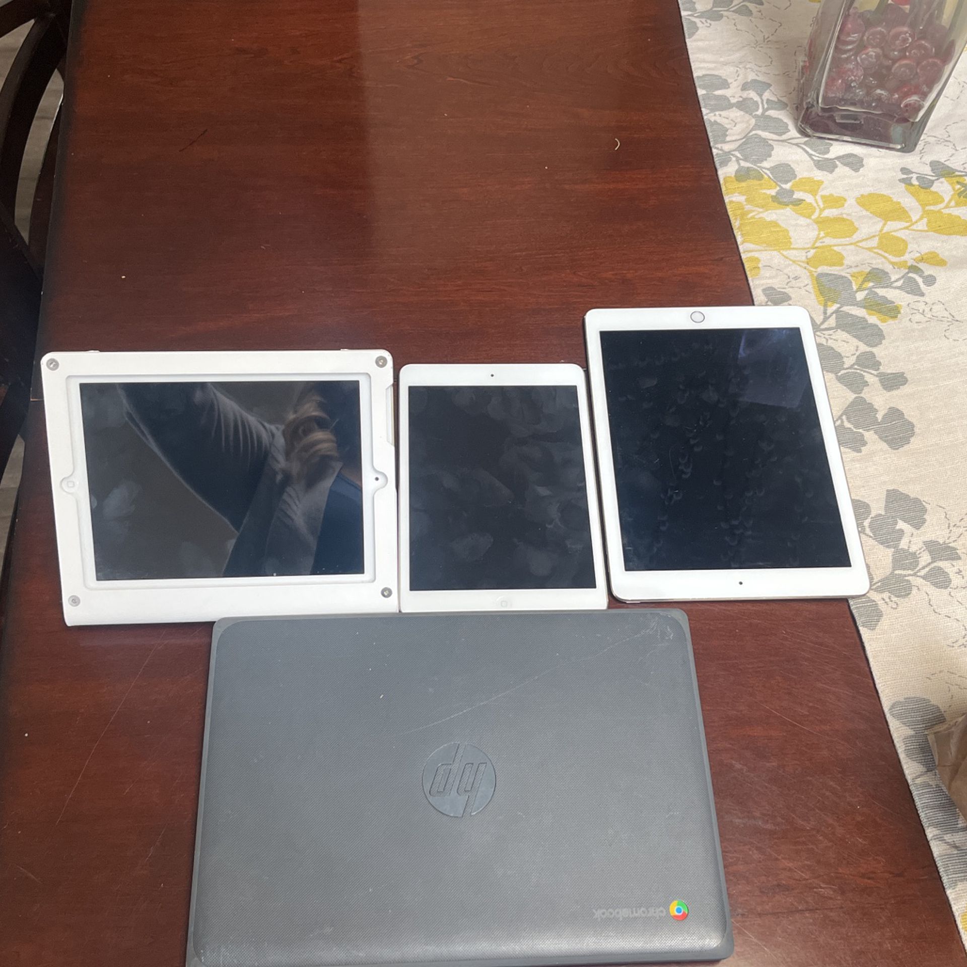 3 iPads , One Chrome Book 