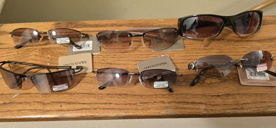 Six pairs of Massini sun glasses